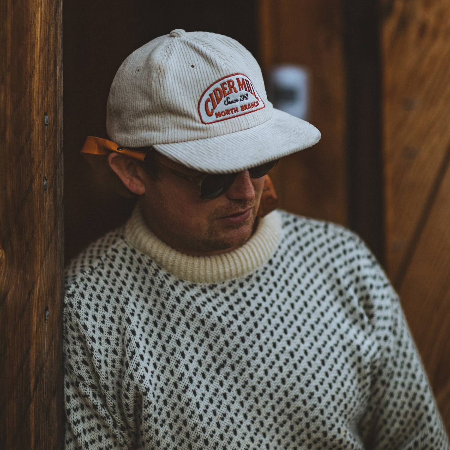 British wool nordic style fisherman sweater in white - ragg wool / birdseye style - on male model